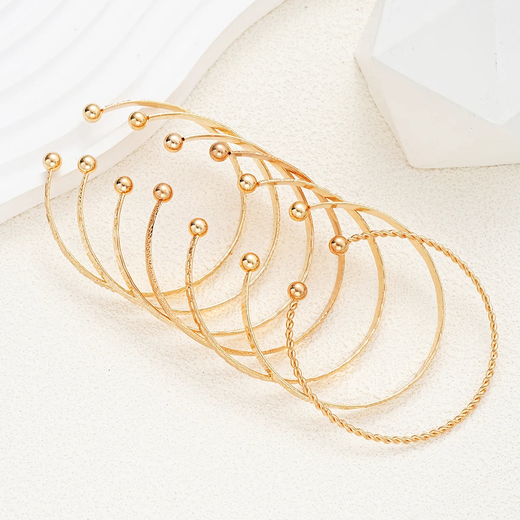 Golden Aura 7-Piece Bracelet Set – Timeless Radiance for Every Look