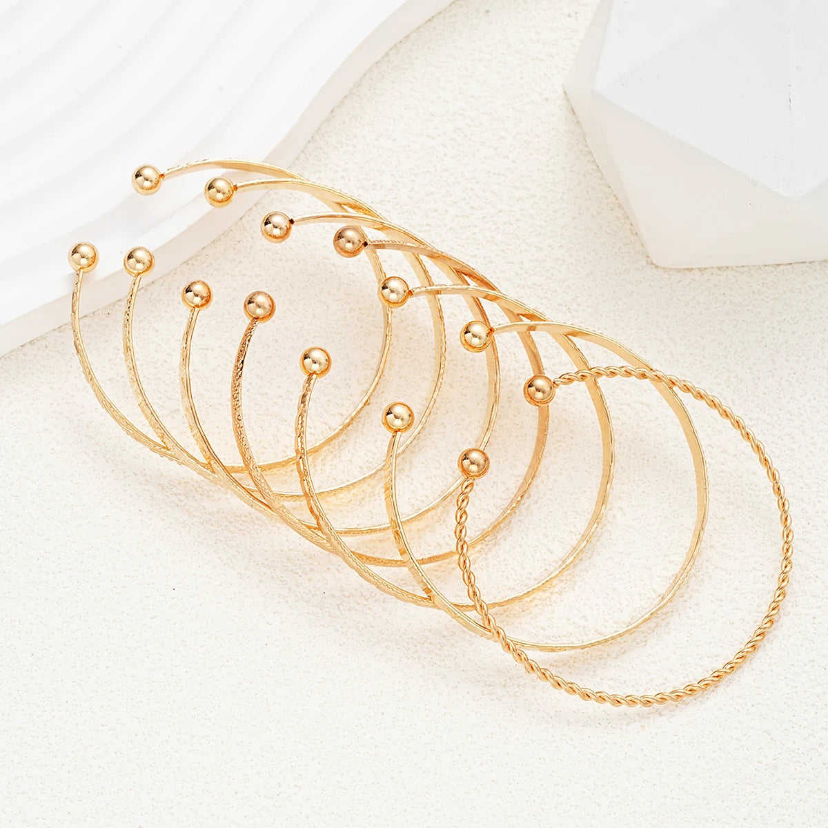 Golden Aura 7-Piece Bracelet Set – Timeless Radiance for Every Look