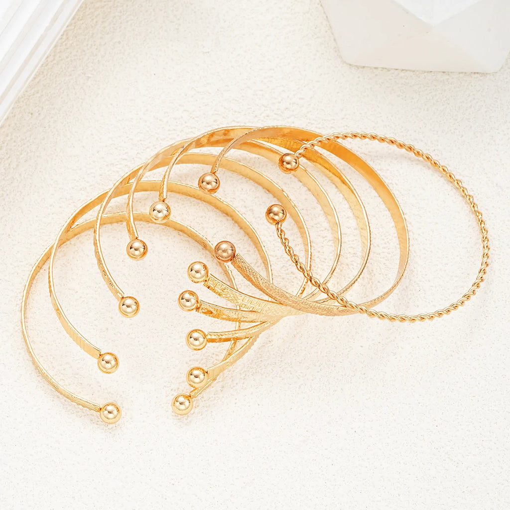 Golden Aura 7-Piece Bracelet Set – Timeless Radiance for Every Look