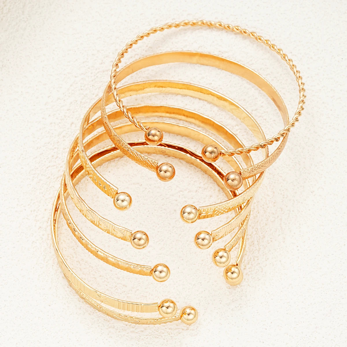 Golden Aura 7-Piece Bracelet Set – Timeless Radiance for Every Look